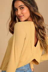 Sweet Side Peach Ribbed Cutout Long Sleeve Top